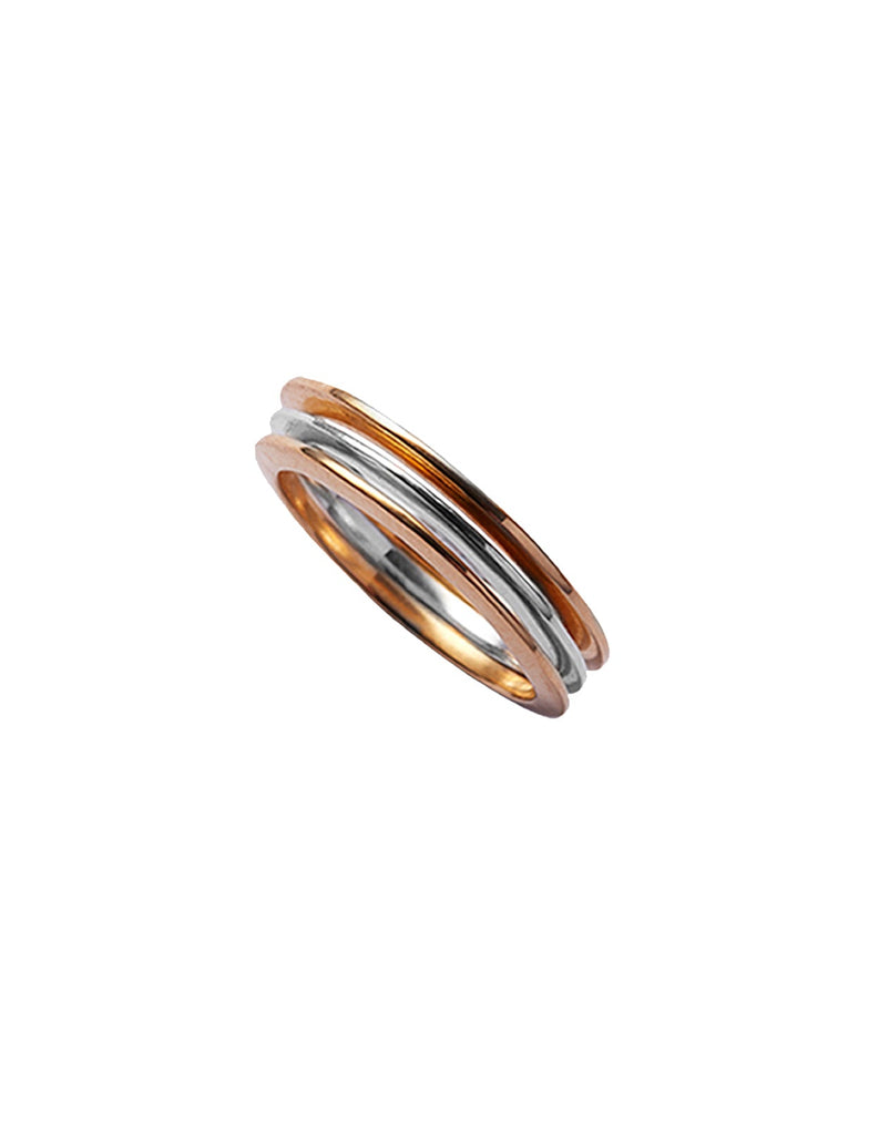 Stack of X rings in silver and gold by May Hofman Jewellery